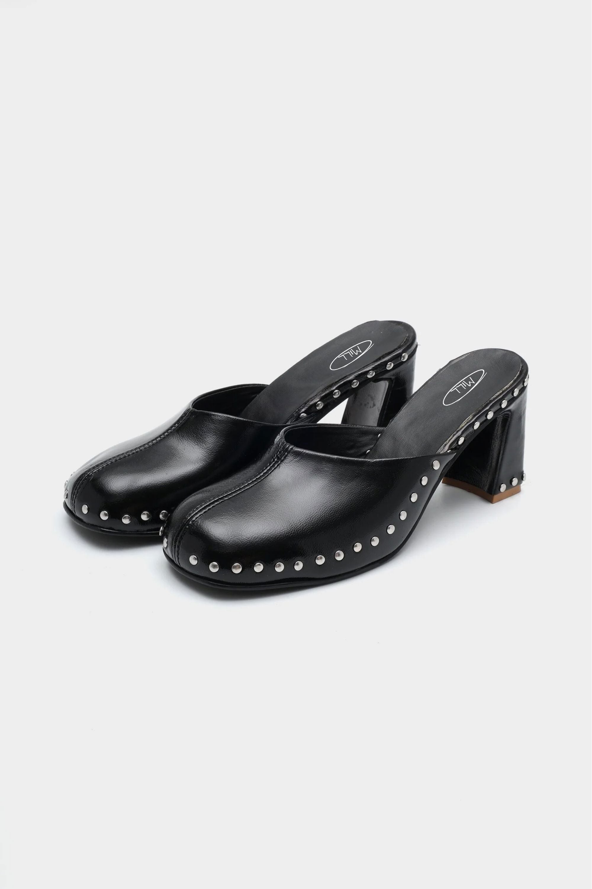 Runway Studded Mule Heels in Onyx